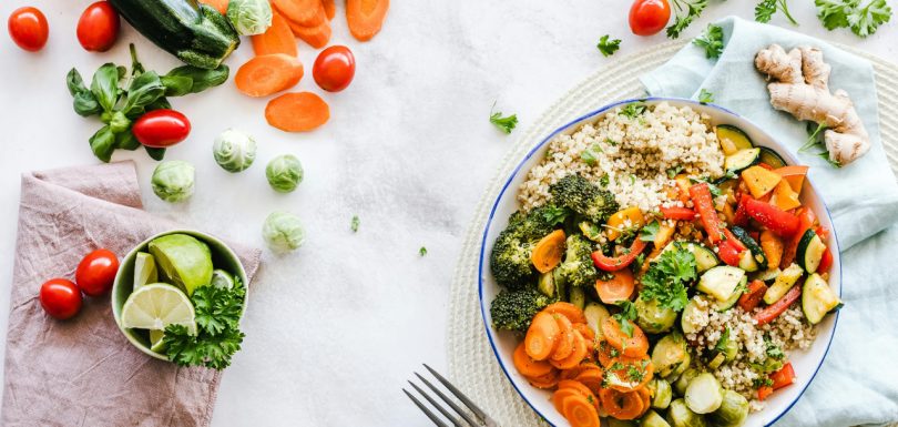 Colorful seasonal vegetables with quinoa in a healthy grain bowl